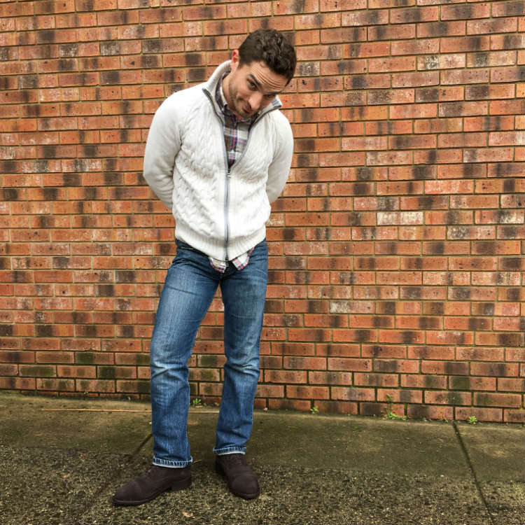 Man In Cream Sweater And Jeans