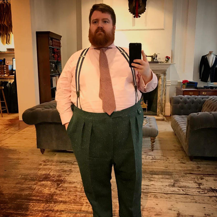 Man In Pink Shirt And Green Pants