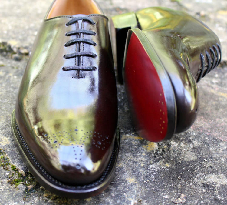 Wholecut Shoe With Red Sole