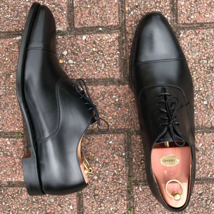 Top And Side View Of Black Captoe Oxford
