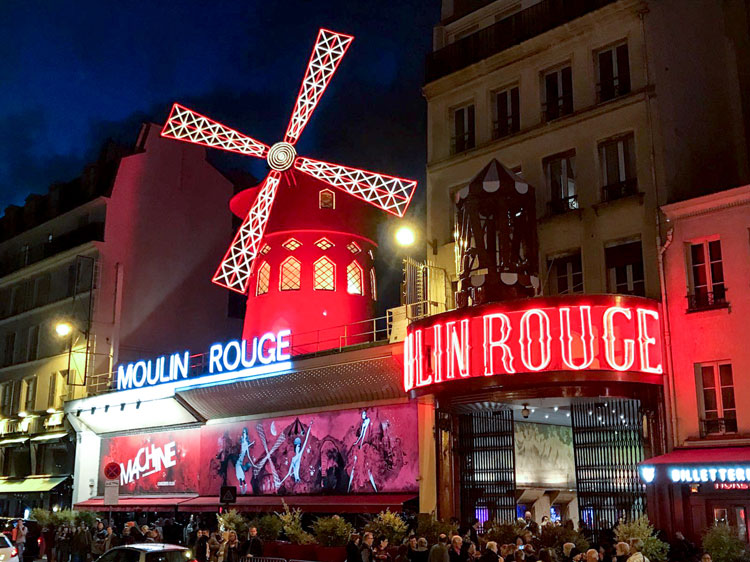 bespoke unit moulin rouge exterior at night