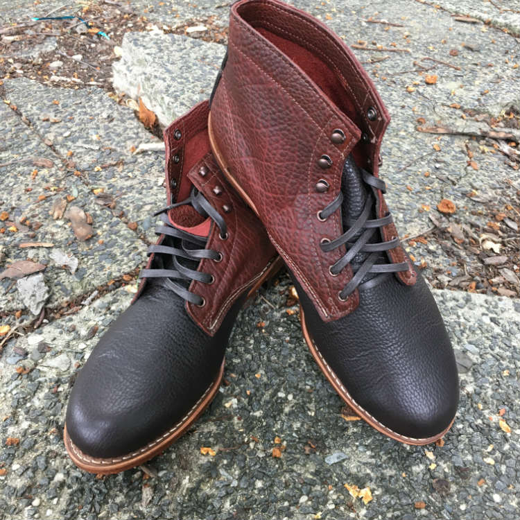 Brown And Red Boots On Concrete