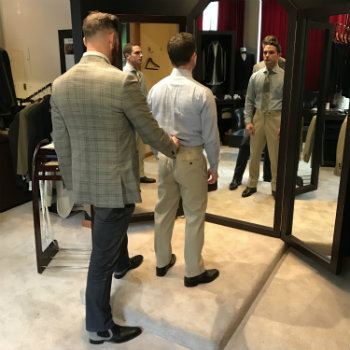 Man Adjusting Pant Waistband