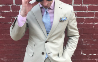 Man In Khaki Suit And Sunglasses