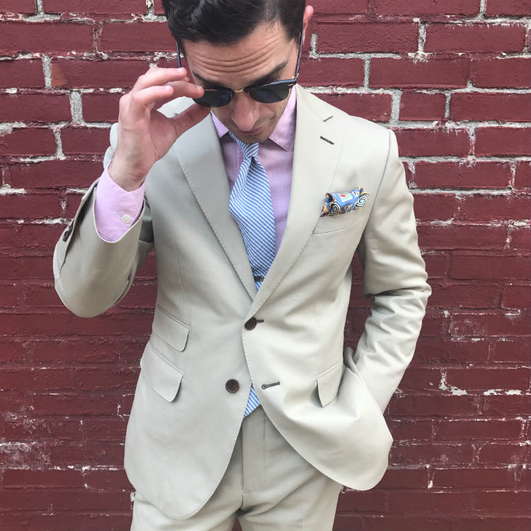 Man In Khaki Suit And Sunglasses
