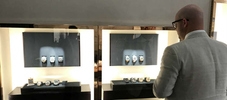 Paul Anthony looking at Richard Mille watch collection