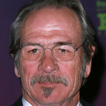Tommy Lee Jones in oval glasses frames