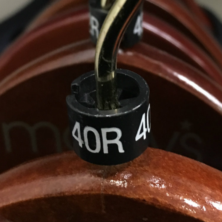 Suit sizing tag on hanger