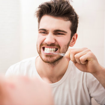 Man-Brushing-Teeth