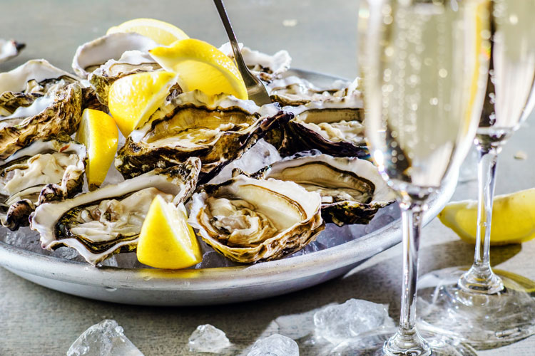 Oysters Platter And Two Champagne Flutes