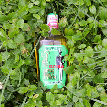 Pinaud Clubman After Shave Lotion Bottle On Bed Of Mint