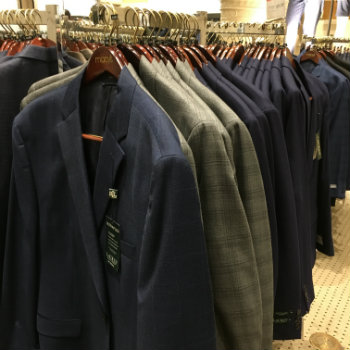 off the rack suits in a store