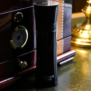 Armani Code Bottle In Front Of Cigar Humidor