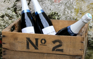 Baron Albert Universelle Champagne Bottles In A Wooden Crate