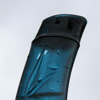 Kenzo Homme Bottle Wet With Sky Background