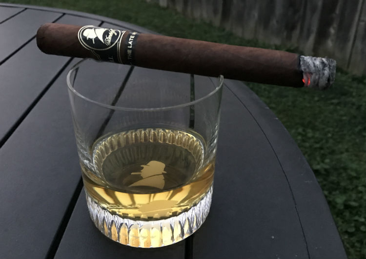 Lit Cigar On Davidoff Whisky Glass
