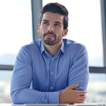 Man-In-Blue-Button-Down-At-Work