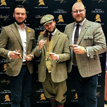 Three Men In Tweed Sports Coats and Blazers Smoking Cigars