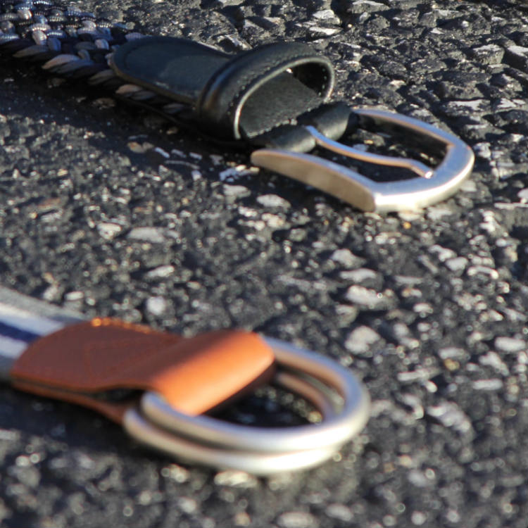 Two belts on concrete