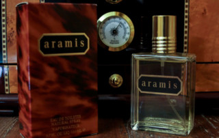 Aramis Bottle & Box In Front Of Humidor