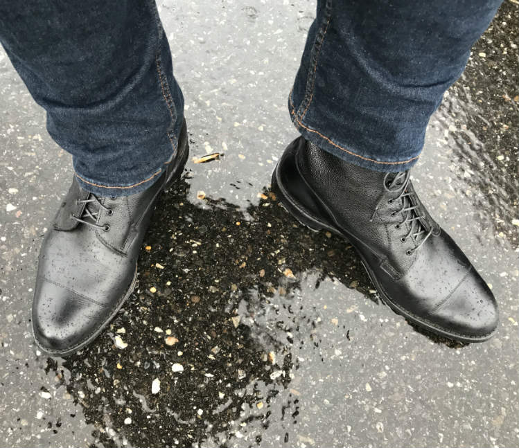 black allen edmonds boots in the rain