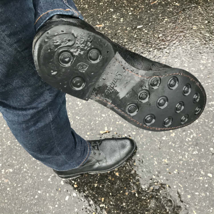black dainite sole allen edmonds boots in rain