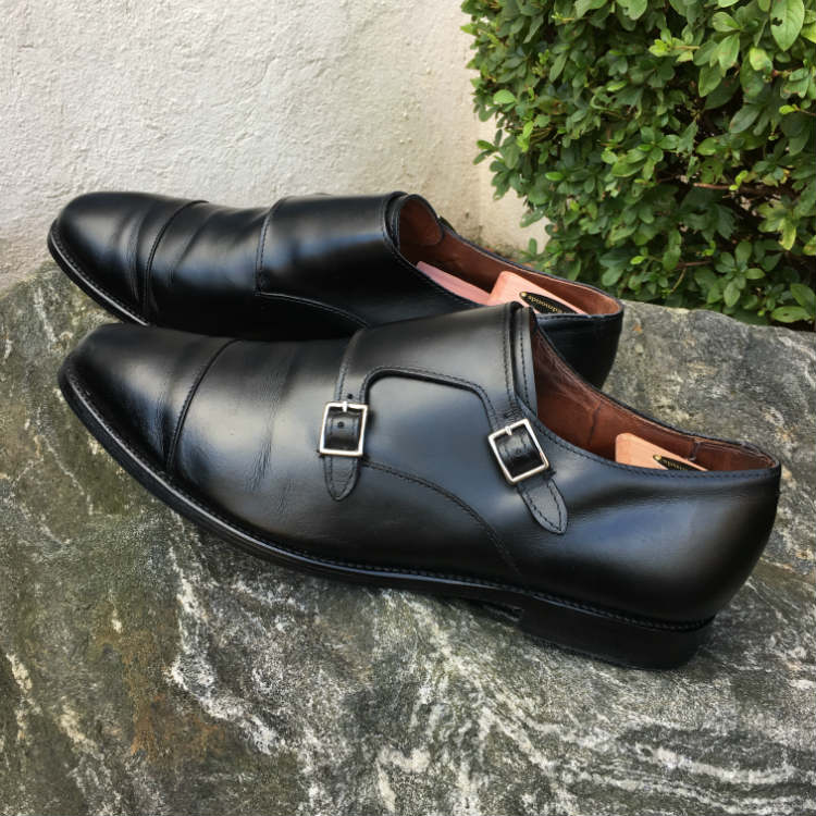 double monk shoes on a stone