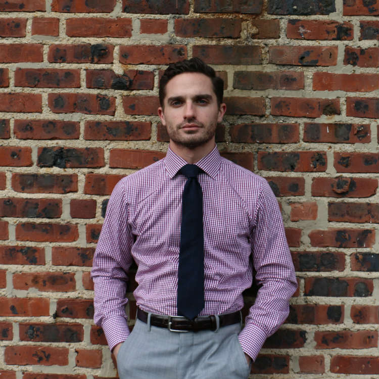 man in tie and trousers