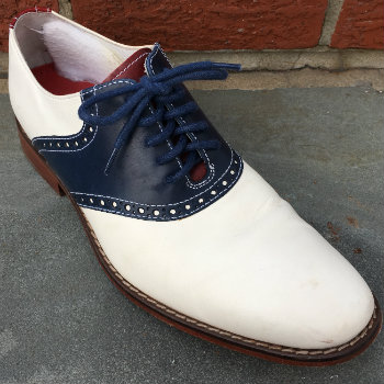 red white and blue saddle shoe