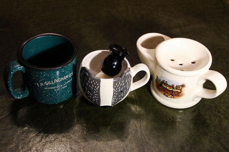 row of different shaving mugs