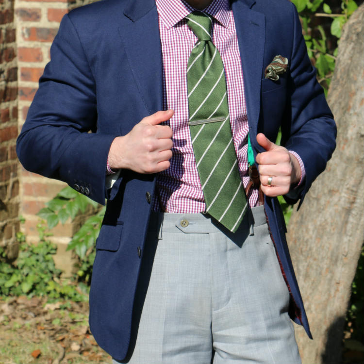 tie clip on green tie