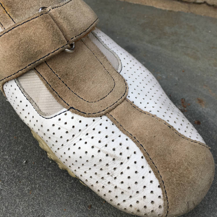 toe of suede sneaker