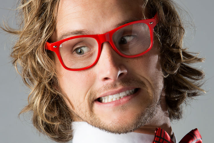 eccentric man wearing red glasses & bow tie eccentric man wearing red glasses & bow tie