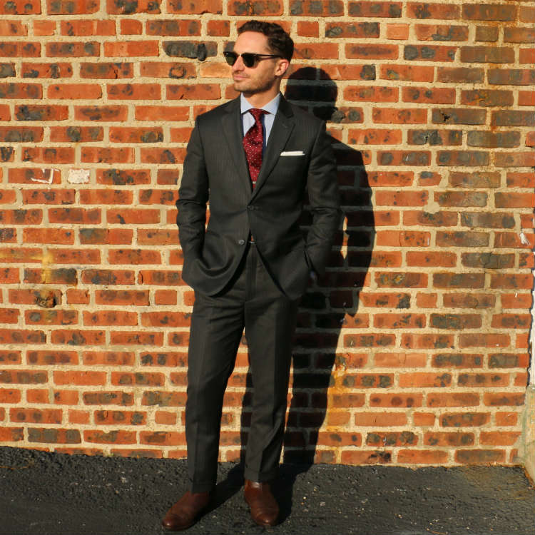man in charcoal grey power suit