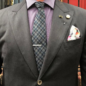 man in houndstooth tie