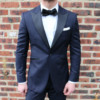 midnight blue tux with black bow tie