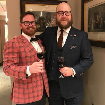 two men in cocktail attire