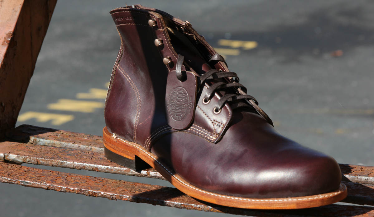 Wolverine 1000 Mile Right Boot On Rusted Metal