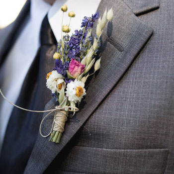 Groom-Wearing-Boutonnière-With-Suit