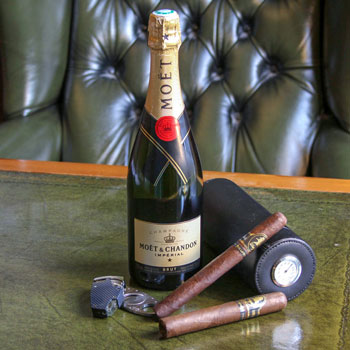 Moet et Chandon Imperial brut bottle and davidoff cigars