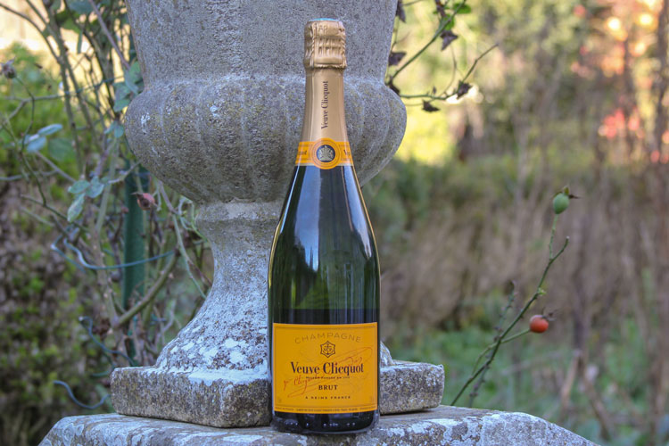 Veuve Clicquot Carte Jaune Bottle On Stone Wall