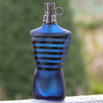 jean paul gaultier ultra male bottle in garden