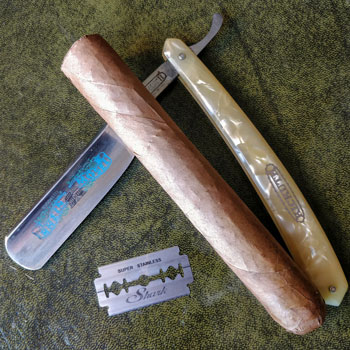 Cutting A Cigar With Straight Razor Blade