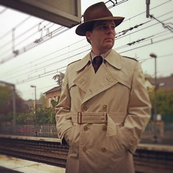 Man In Fedora & Trench Coat