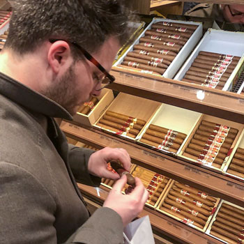 Selecting Cigars At A Tobacconist's