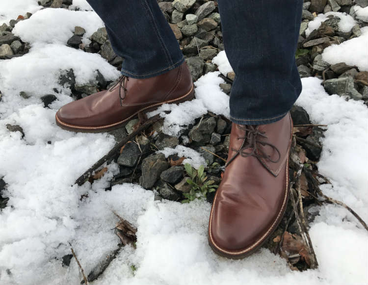 Brown Leather Boots On Snow
