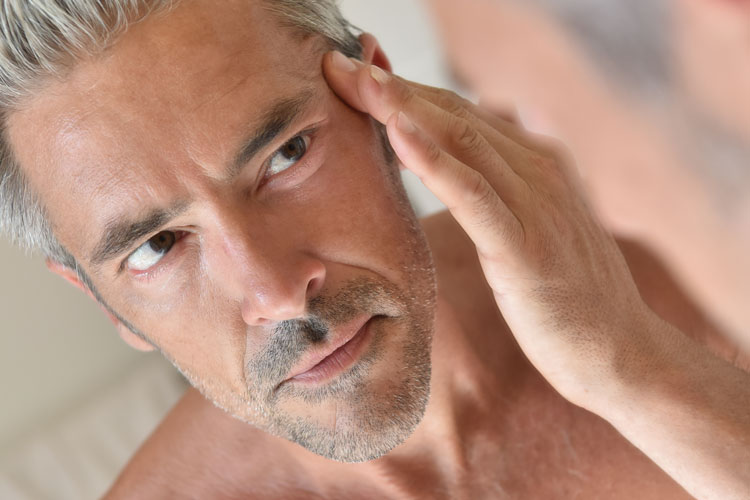 Man-In-Front-Of-Mirror