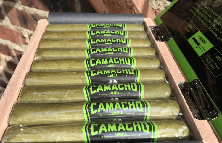 Row of Double Claro Camacho Candela Cigars In Box