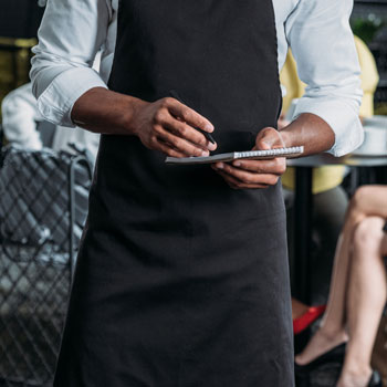 Black Waiter Taking Orders