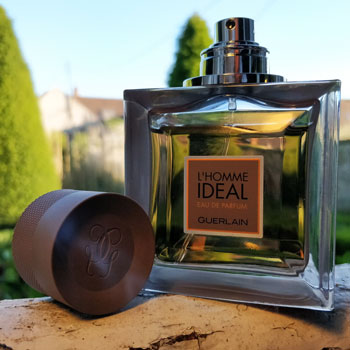 Guerlain L'Homme Ideal Eau de Parfum Bottle On Window